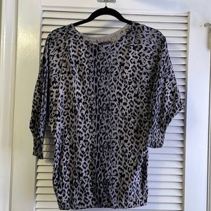 Black and white cheetah print sweater.